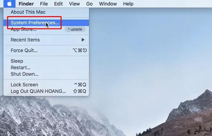 Click vào biểu tượng Apple và chọn System Preferences