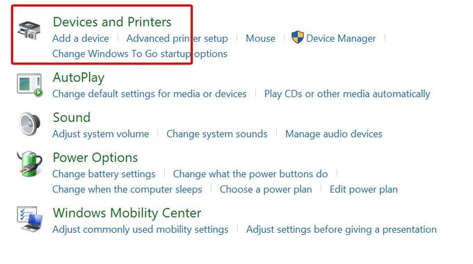 Vào mục Devices and Printers