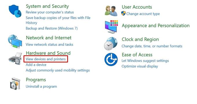 Vào Control Panel và chọn View devices and printers