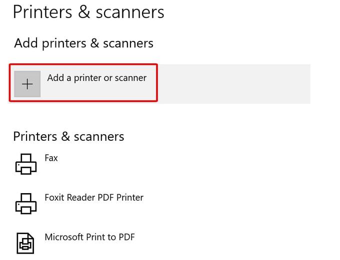 Chọn Add a printer or scanner để dò tìm máy in