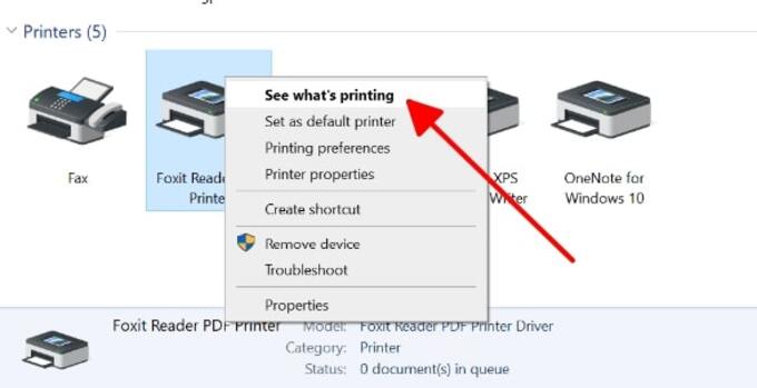 Click chuột phải vào máy in cần sửa lỗi rồi chọn See what’s printing